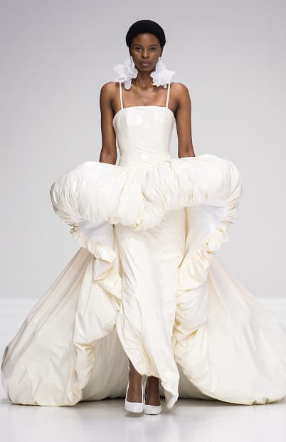 Model in voluminous white gown